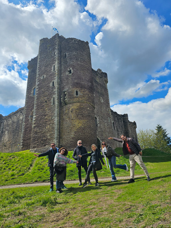 image of a group with a castle in the background
