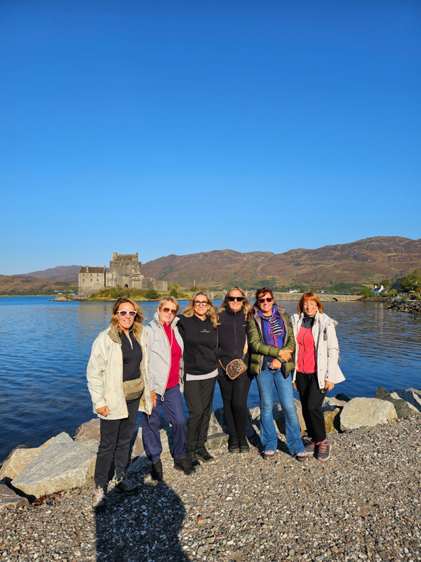 image of a group and castle in the background